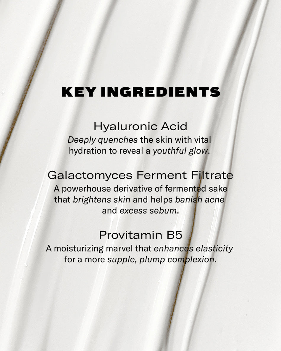 White cream texture spread in smooth waves with key ingredients text overlay in black font.