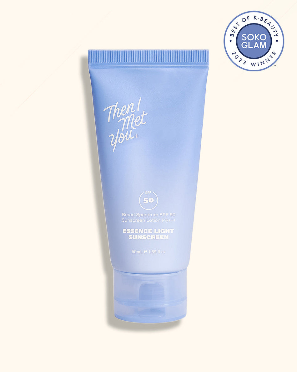 Light blue tube of Essence Light Sunscreen SPF 50 PA+++ with white text and flip cap.