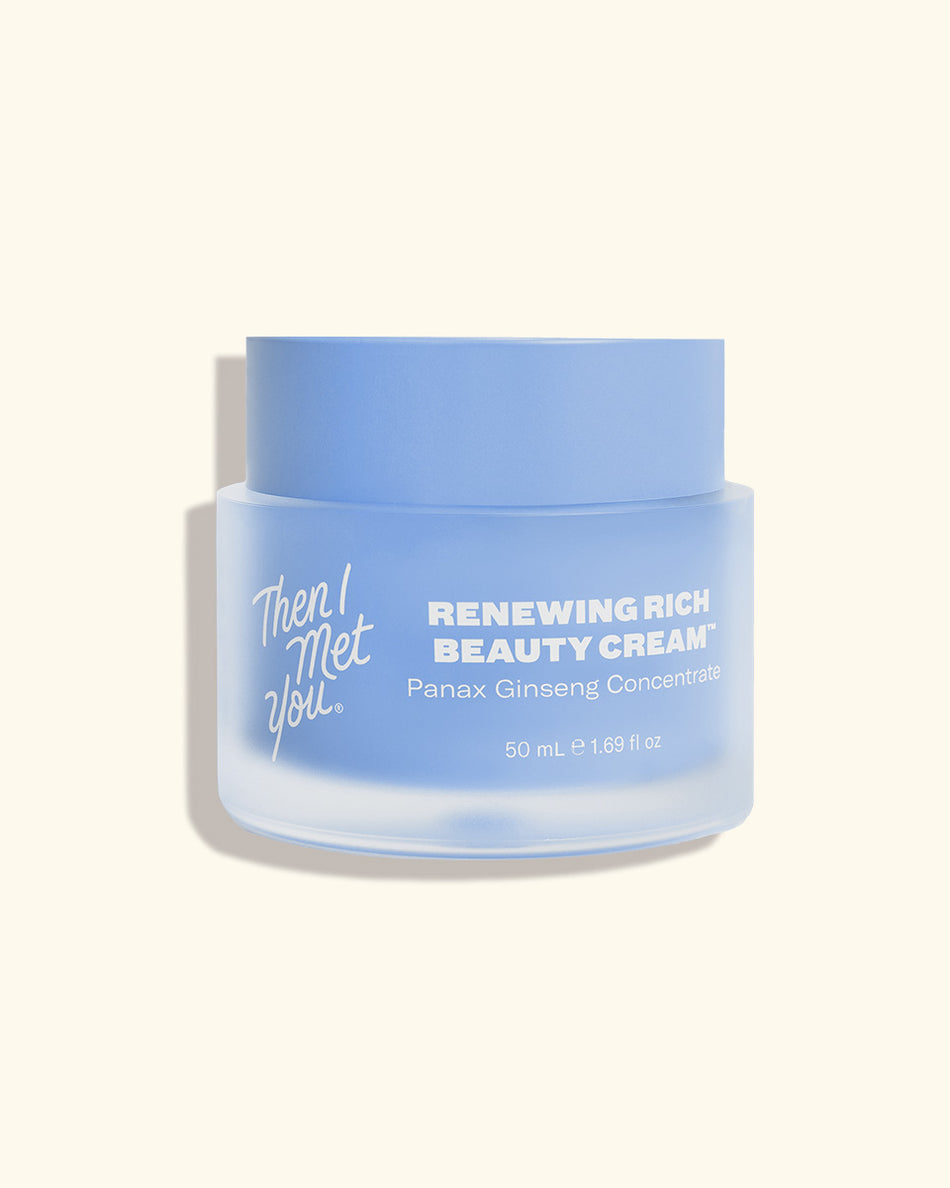 Light blue frosted jar of Renewing Rich Beauty Cream with white lid and white text on front.