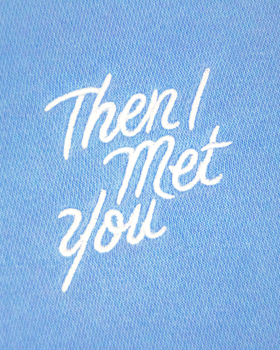 Periwinkle blue pullover with white cursive "Then I Met You" text on front.